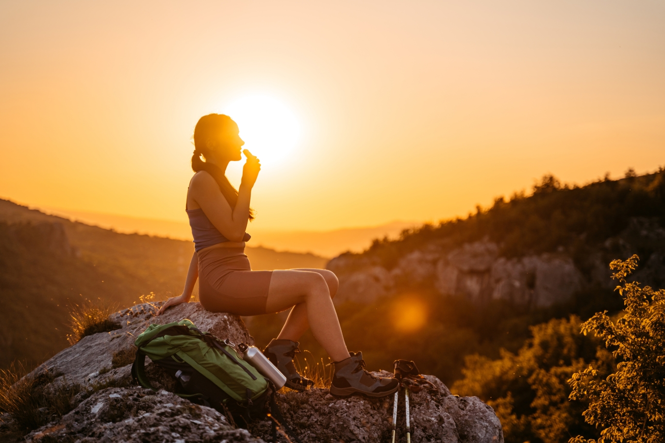 Hiker eating protein bar cold seal wrapped